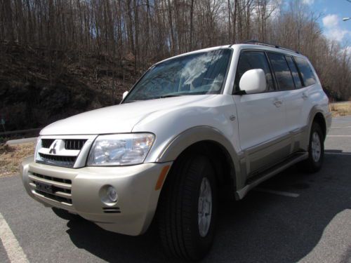 2003 mitsubishi montero limited,4wd,3 rd seats,looks  new,clean carfax,warranty!