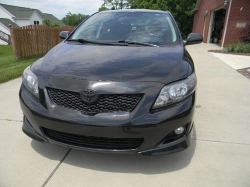 One owner 2009 black toyota corolla xrs 5-spd 2.4l 65k hwy miles $12,495 obo