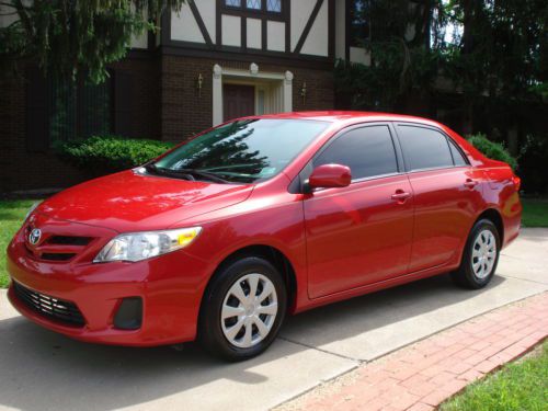 Nice 2011 toyota corolla red le sedan 4-door 1.8l auto pwr gas saver super clean