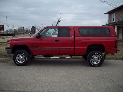 4x4, slt, red, extended cab, short box, 5.9 cummins, auto trans, new tires