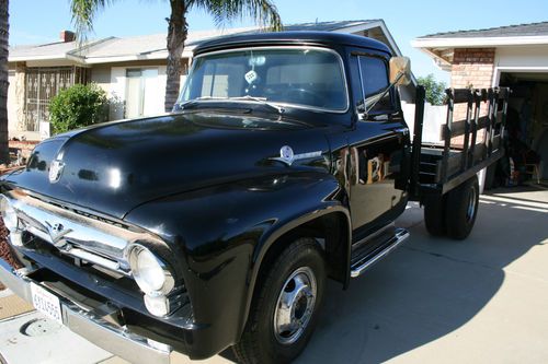 Partially restored f-350 stake bed truck.  mostly original. body and paint done.