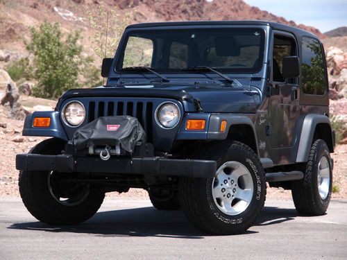 Mint condition 2001 jeep wrangler sport hardtop, winch, not abused whatsoever