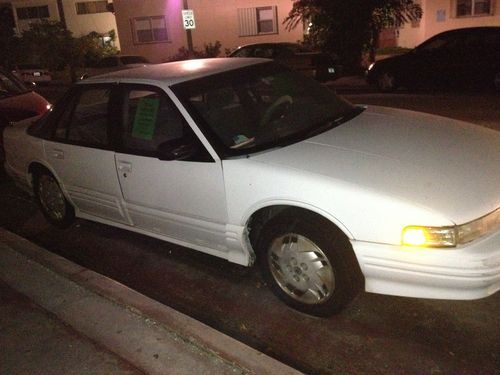 White, automatic, 173,000 miles. 1 owner