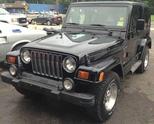 1999 jeep wrangler sahara 5spd super claen, like new, low miles, rare find