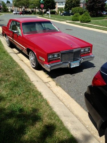 Beautiful red 1980 cadillac eldorado with white leather interior