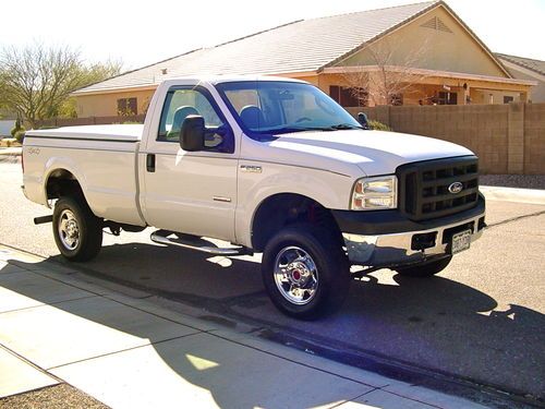 2006 ford f250 4x4  diesel 6.0 power stroke, reg cab , long bed,low miles, alarm