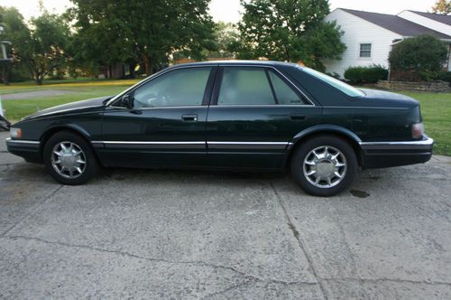 1996 cadillac sls  seville 4 door sedan dark green v8 tan leather interior