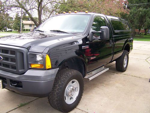 Ford f-350 heavy super duty 4x4 black pickup truck