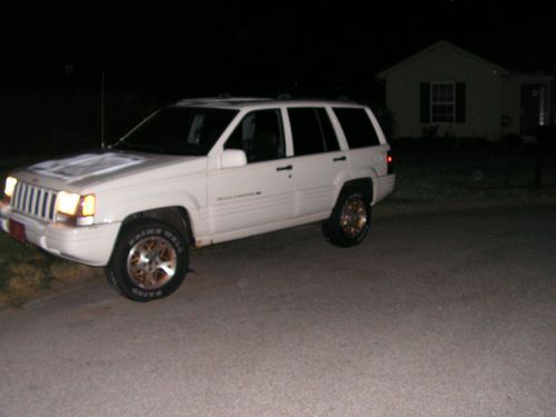 White exterior with black leather interior