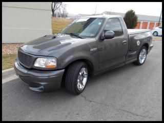 2003 ford f-150 svt lightning / cloth bed liner / tonneau / subwoofer / amp