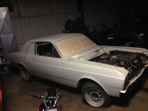 1966 ford falcon/ primer/very solid condition.