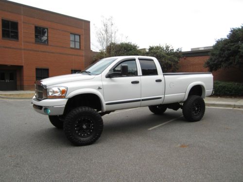 06 dodge ram 2500 slt,4wd, 5.9 cummins turbo diesel, fabtech lifted, low miles