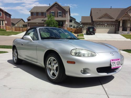 Convertible time! clean, garaged, silver with black top, 2 door, service records