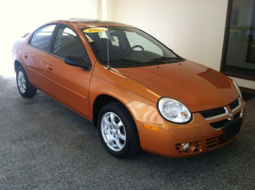 Orange 4 door sedan black interior sunroof carfax two owners low miles for year