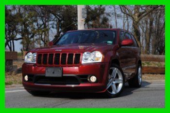 Hemi 6.1l awd navigation 23000 miles loaded full power brembo brakes excellent