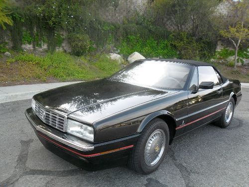 Two-owner, super low miles, perfect carfax, perfect top, always garaged, lovely