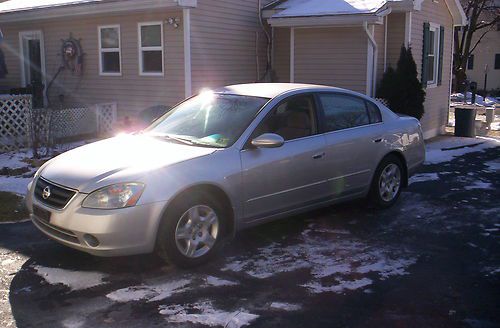 2002 nissan altima s sedan 4-door 2.5l 5 spd. newer nissan engine 35k no reserve