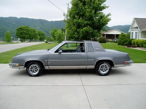 1985 oldsmobile cutlass salon.. 8k actual miles. never seen rain. v8. t-tops.