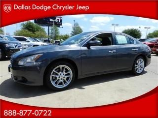 Four door luxury sedan 3.5 liter six cylinder automatic sunroof pushbutton