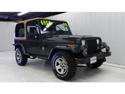 We finance, we ship, low miles, stock, 5 speed, inline 6, sahara,hard top, a/c