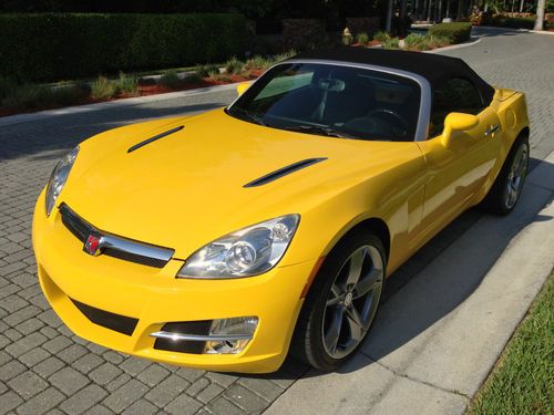 2007 saturn sky convertible 2-door 2.4l yellow with black leather seats 19" rims