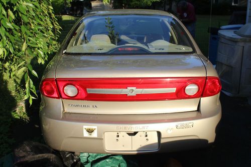 2003 chevrolet cavalier ls sedan 4-door 2.2l tan automatic cheap broken shell