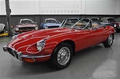 V12 4 speed a/c jaguar xke in red with biscuit