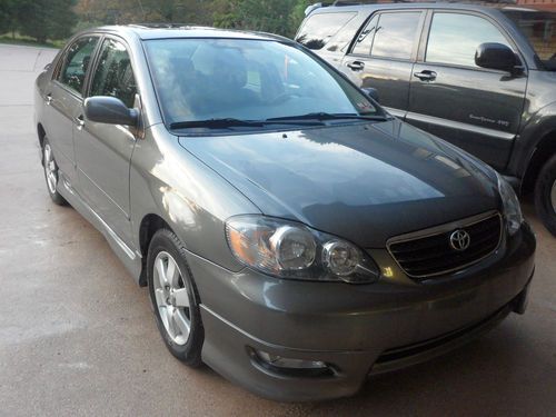 2008 toyota corolla sport  4-door original owner  grey sunroof  great on gas !