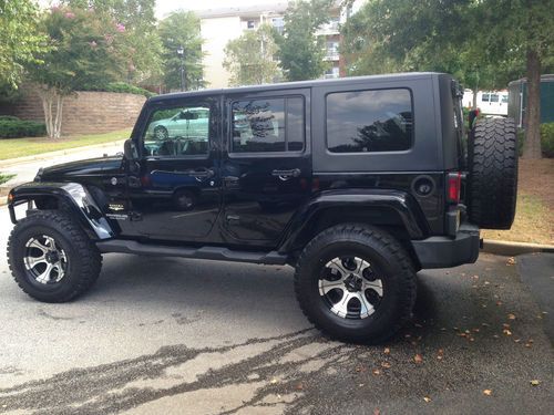 Jeep wrangler unlimited sahara 4-door 3.8l (lifted &amp; off road capable) - 2008