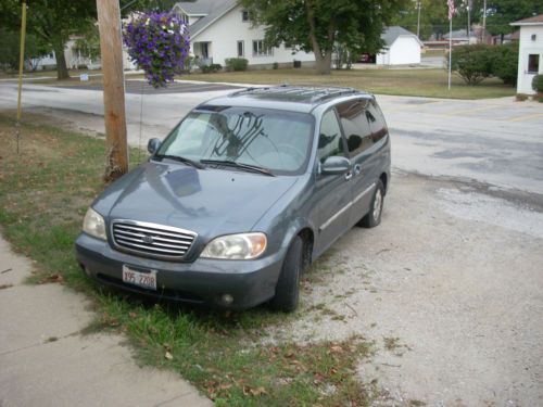 2002 kia sedona ex leather seats sun roof runs good 176,000 hwy miles orig owner