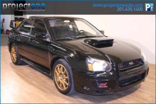 05 sti 97k miles black