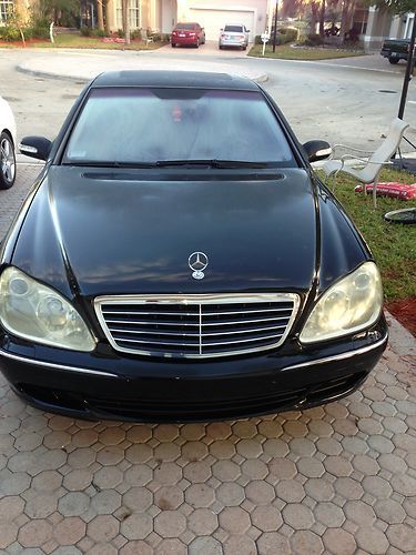 Black on black with factory chrome rims