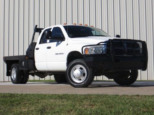 05 3500 cummin 5.9 (h.o) 6-speed manual 4x4 flat-bed (24 records) carfax tx !!!!