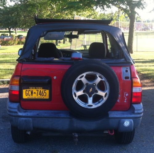 1999 CHEVROLET TRACKER 2 DOOR RED GREAT DEAL IN NEED OF A LITTLE TLC, image 2