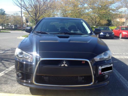 Mitsu ralliart. almost new condition. every option! black on black! head turner!