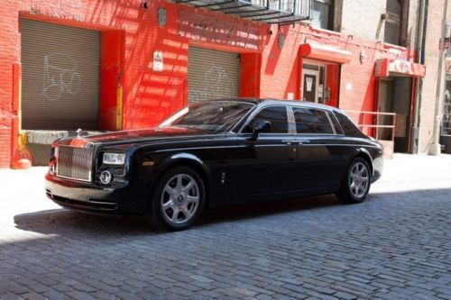 2010 rolls-royce phantom ewb in black with a moccasin interior