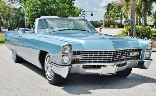 Simply beautiful  1967 cadillac deville convertible restored and drives sweet.