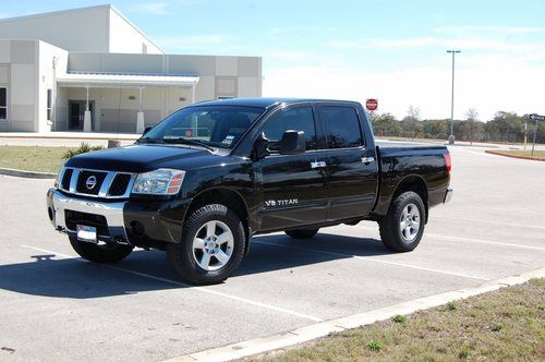 2006 nissan titan se 4wd crew cab w/ upgrades - 2 video sceens, performance, etc