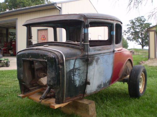 1930 model a coupe body with title and many extra parts including frame.