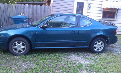 Teal 2 door coupe low miles(daily driver)