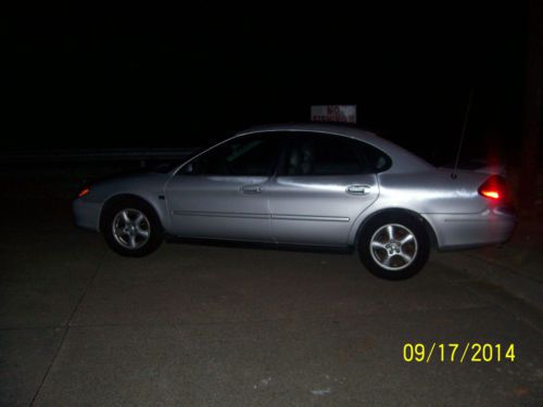 Ford taurus runs great! 24v dohc 3.0 v6  leather, cd, sunroof, spoiler and more!