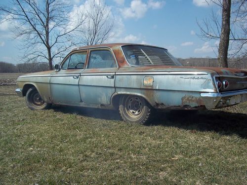 1962 bel air  4dr sedan 235 6cyl 3speed manual