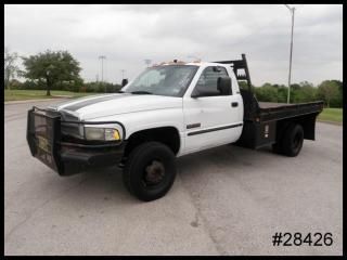 3500hd 5.9l cummins diesel 5 speed manual 11' j and i flatbed dually we finance