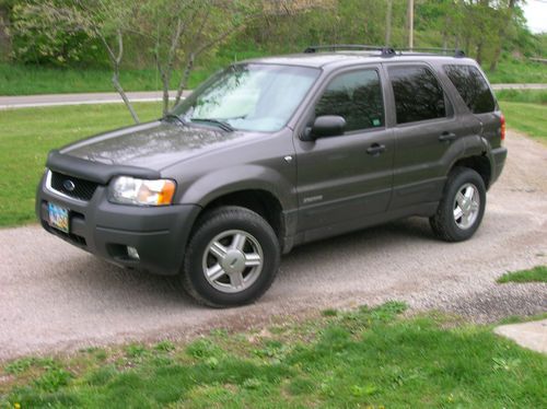 2002 ford escape 105,000 miles, only 500 miles on rebuild.  good cond. power a/c