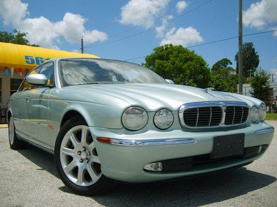 05 fla jaguar xj sedan seafrost with ivory leather  40 pics no reserve auction