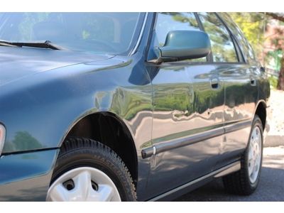 LX Manual 2.2L Front Wheel Drive Wheel Covers Steel Wheels Power Steering A/C, image 2