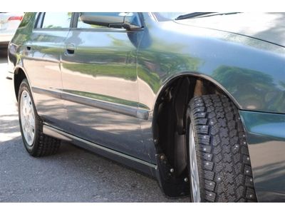 LX Manual 2.2L Front Wheel Drive Wheel Covers Steel Wheels Power Steering A/C, image 11