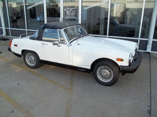 1978 mg midget really solid car good condition lots of oem parts go with it