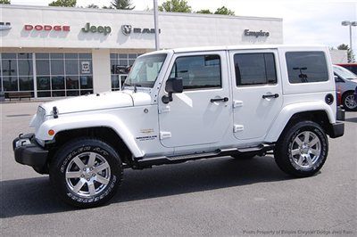 Save at empire dodge on this new unlimited sahara auto 4x4 with leather and gps