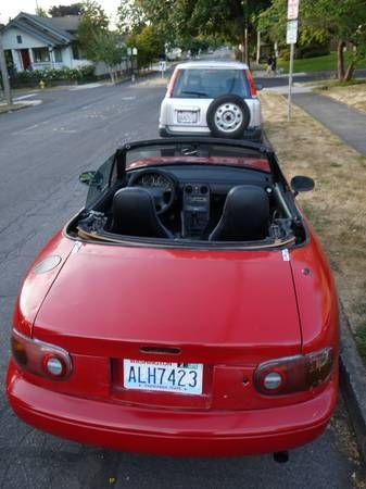 1990 mazda miata base model, power steering, tan top, 184000 miles